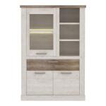 Opis Elegancka witryna wykonana w połączeniu pięknych dekorów- Pinia Biała i Dąb Antyczny wprowadzi do pomieszczenia dużo stylu i klasy. Jej praktyczny projekt bardzo ułatwi organizację w salonie lub jadalni. Witryna posiada trzy otwarte i dwie przeszklone półki, pojemną szufladę oraz dużą szafkę otwieraną za pomocą pary drzwiczek. Górny wieniec oraz front szuflady w dekorze Dębu Antycznego podkreśla nowoczesny, stylowy design mebla Masywne uchwyty w kolorze nikiel mat z metalu podkreślają lekkość całej kompozycji Zestawienie dekorów odwzorowujących drewno wprowadzi do wnętrza domowego i przytulnego klimatu Istnieje możliwość dokupienia oświetlenia LED, które pełniej wyeksponuje i doda dekoracyjnego charakteru przedmiotom znajdujących się w przeszklonej części Nóżki witryny z funkcją regulacji Witryna wyposażona w odporne i wytrzymałe na uszkodzenia obrzeże ABS Elementy do montażu ściennego w zestawie Witryna wykonana z wysokiej jakości płyty wiórowej Szczegóły produktu Informacje logistyczne Instrukcje montażu i karty bezpieczeństwa produktu Witryna L Indeks: DURV521L-T75 DMFW-15 DAMIAN witryna