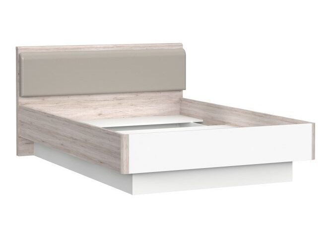 Opis Sypialnia odgrywa ważną rolę w życiu każdego z nas – to tu regenerujemy organizm po aktywnym dniu, czytamy książki i odpoczywamy. Nie ulega wątpliwości, że kluczowym elementem każdej sypialnianej strefy jest łóżko. Nasze łóżko z zagłówkiem spełni Twoje wymagania estetyczne oraz sprawi, że spędzona w zaciszu Twojej sypialni noc zaowocuje zdrowiem, świetnym samopoczuciem i dużą dawką energii. Łóżko przeznaczone jest do materaca o powierzchni 140x200 cm (sprzedawane jest bez materaca), wymagany wkład na ramie Łóżko dostępne w trzech oryginalnych wersjach kolorystycznych: Dąb Szlachetny Tekstowy/Dąb Czarny, Uni Wolfram Szary/Biały/Czarny/Orientalny Zielony, Dąb Piaskowy/Biały Połysk Łóżko wykonane z wysokiej klasy płyty wiórowej, tapicerka z beżowej ekoskóry Wytrzymałe i odporne na uszkodzenia mechaniczne obrzeże ABS Nóżki ze ślizgaczem, które zadbają o Twoje podłogi Wygodny, tapicerowany zagłówek, który to nie jest tylko efektowną dekoracją, lecz przede wszystkim komfortowym oparciem Łóżko można wyposażyć w dodatkowe oświetlenie dostępne w ofercie: lampki nocne montowane do wezgłowia lub listwy oświetleniowe montowane pod stelażem Mebel jest bardzo łatwy w montażu Zaledwie drobne zabiegi pielęgnacyjne, powszechnie dostępnymi i niedrogimi środkami do pielęgnacji mebli sprawią, że łóżko pozostanie w idealnym stanie przez bardzo długie lata Szczegóły produktu Informacje logistyczne Instrukcje montażu i karty bezpieczeństwa produktu Łóżko 140x200 cm RONDINO Dąb Piaskowy/Biały Indeks: RDNL242-T30 RAFS-07 RADEK stelaż łóżka