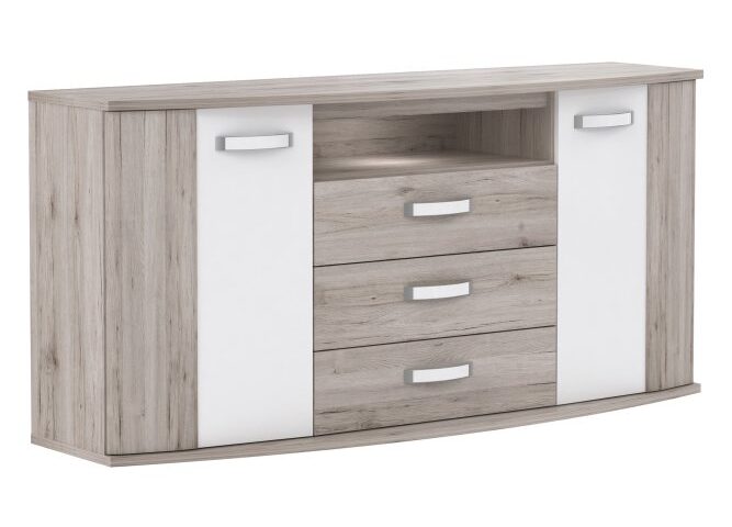 Opis Szeroka komoda to wspaniałe dopełnienie Twojej sypialni lub pokoju dziennego. Mebel zapewnia dużo przestrzeni wszelakiego użytku. Cechuje się wyrazistym designem i dbałością o każdy szczegół. Wieniec i cokół komody zostały wyprofilowane w łuk i lekko wysunięte, co nadaje całości niepowtarzalnego charakteru Do wyboru trzy dekory: Biały Połysk i Dąb Szlachetny, Dąb Czarny i Dąb Szlachetny, Biały Połysk i Dąb Piaskowy Wysokiej jakości płyta wiórowa, a wewnętrzna tylna ściana wykonana z lakierowanej płyty HDF, foliowanej płyty HDF Prowadnice kulkowe gwarantują komfort otwierania szuflad, ślizgacze na nogach mebla są idealne do jego przesuwania bez uszkodzeń podłogi, a obrzeże ABS świetnie zabezpiecza mebel Uchwyty masywne, z elementami w kolorze białym Pojemna i wytrzymała komoda pomieści dużo niezbędnych w każdym domu przedmiotów Została wyposażona w trzy szuflady, dwie zamykane szafki oraz podświetlaną wnękę na podręczne drobiazgi Komoda wyposażona w oświetlenie dające zimne, białe światło Maksymalne obciążenie komody to 40 kg Komoda jest łatwa w montażu przy korzystaniu z załączonej instrukcji, a także jest łatwa w czyszczeniu Szczegóły produktu Informacje logistyczne Instrukcje montażu i karty bezpieczeństwa produktu Komoda Indeks: RDIK231B-T30 RAFK-05 RADEK komoda